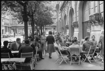 people sitting at a sidewalk cafe in Belgrade in 1959